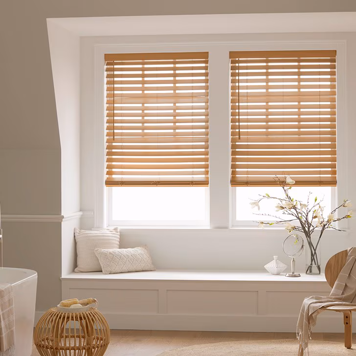 UC Blinds professional team installing new window blinds